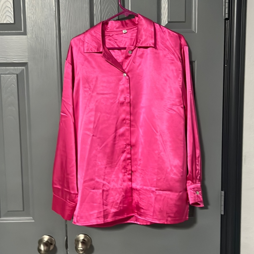 Worn once.  Silk pink button up